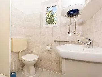 Two-Bedroom Apartment in Okrug Donji with Sea View Balcony