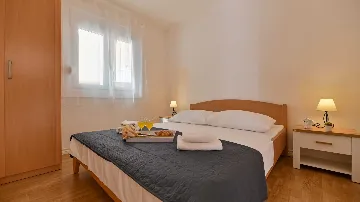 Two-Bedroom Apartment in Trogir for 4 Guests