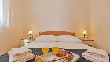 Two-Bedroom Apartment in Trogir for 4 Guests