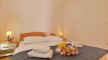 Two-Bedroom Apartment in Trogir for 4 Guests