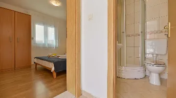 Two-Bedroom Apartment in Trogir for 4 Guests