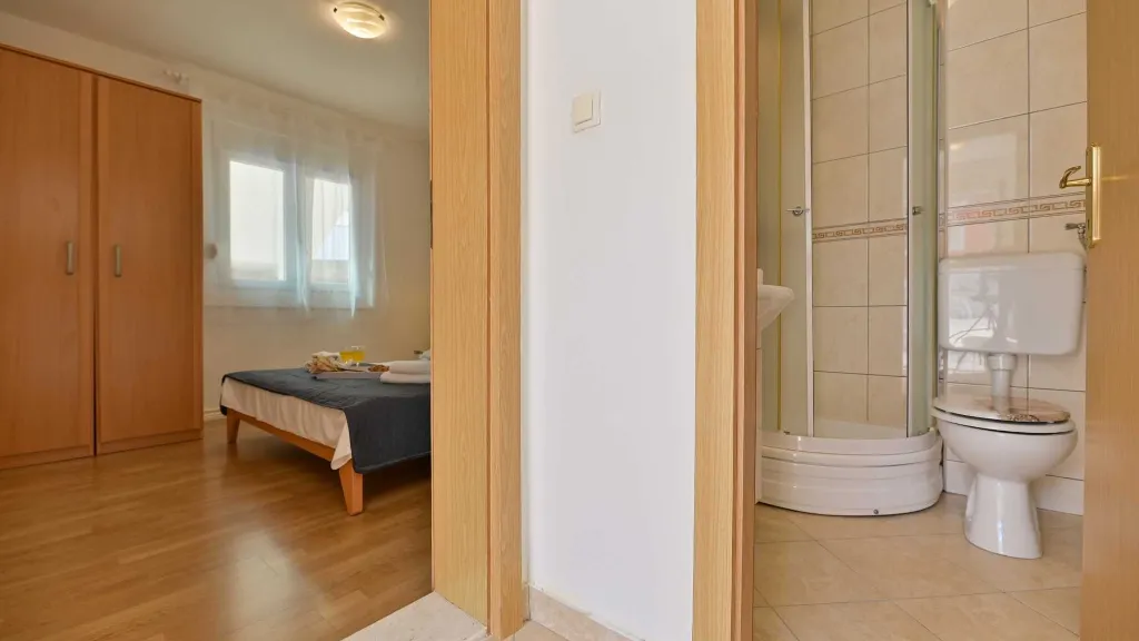 Two-Bedroom Apartment in Trogir for 4 Guests